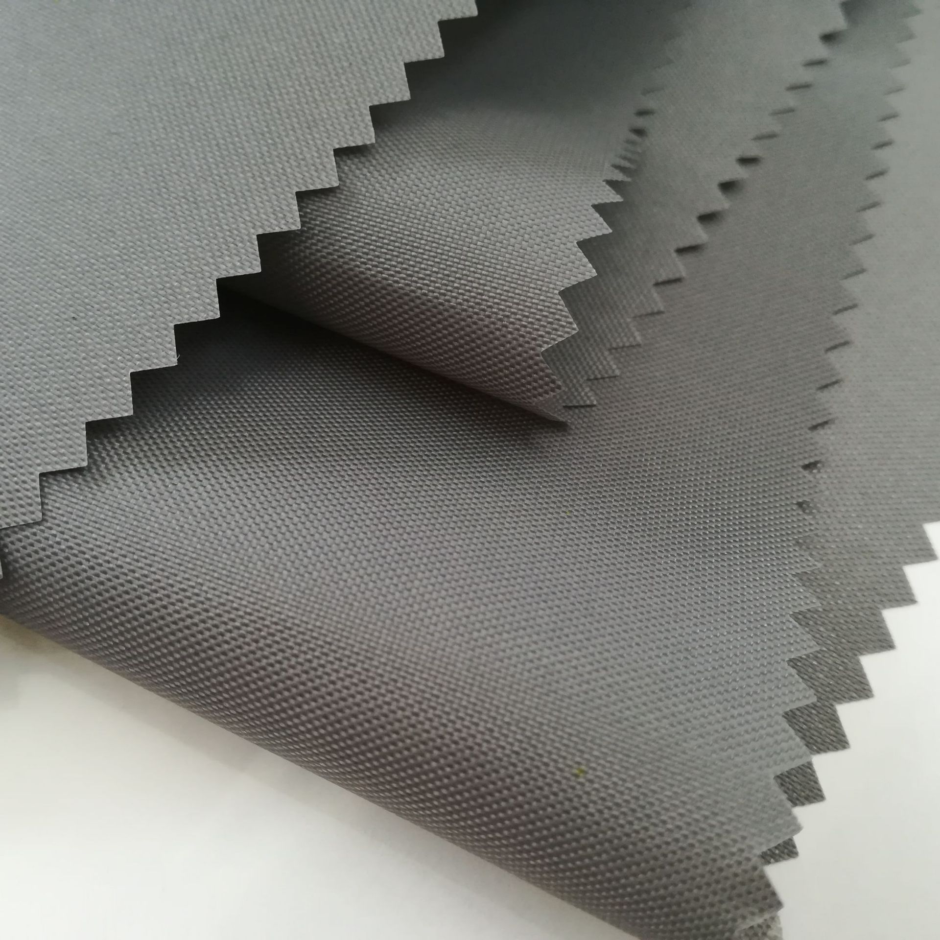 210d114t尼龙牛津布防水pu涂层耐水压阻燃抗撕裂箱包手袋面料