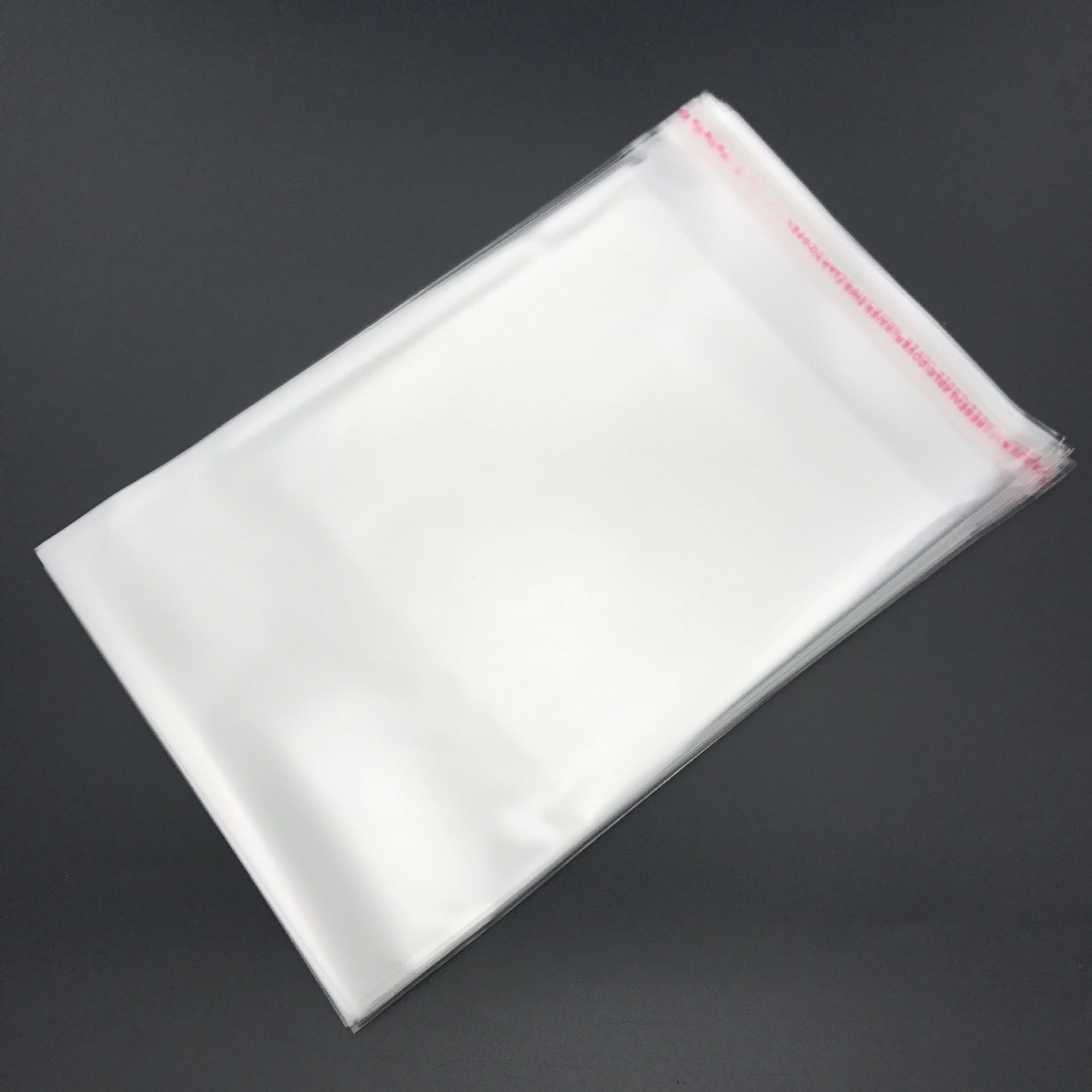 厂家批发塑料袋/透明opp袋/opp不干胶自粘袋塑料服装包装袋可定制