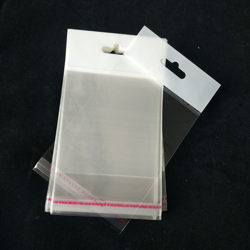 现货opp卡头袋珠光膜挂孔袋透明塑料袋饰品包装小袋子粉扑包装袋