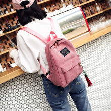 2022新款条绒双肩包女日韩版撞色流苏书包旅行背包学院风清新女包