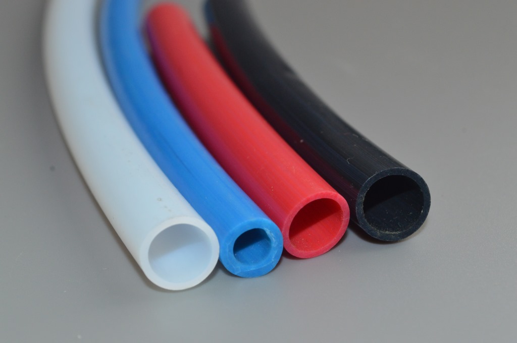 厂家供应耐高低温防腐蚀乳白色黑色红色彩色四氟盘管公制英制齐全