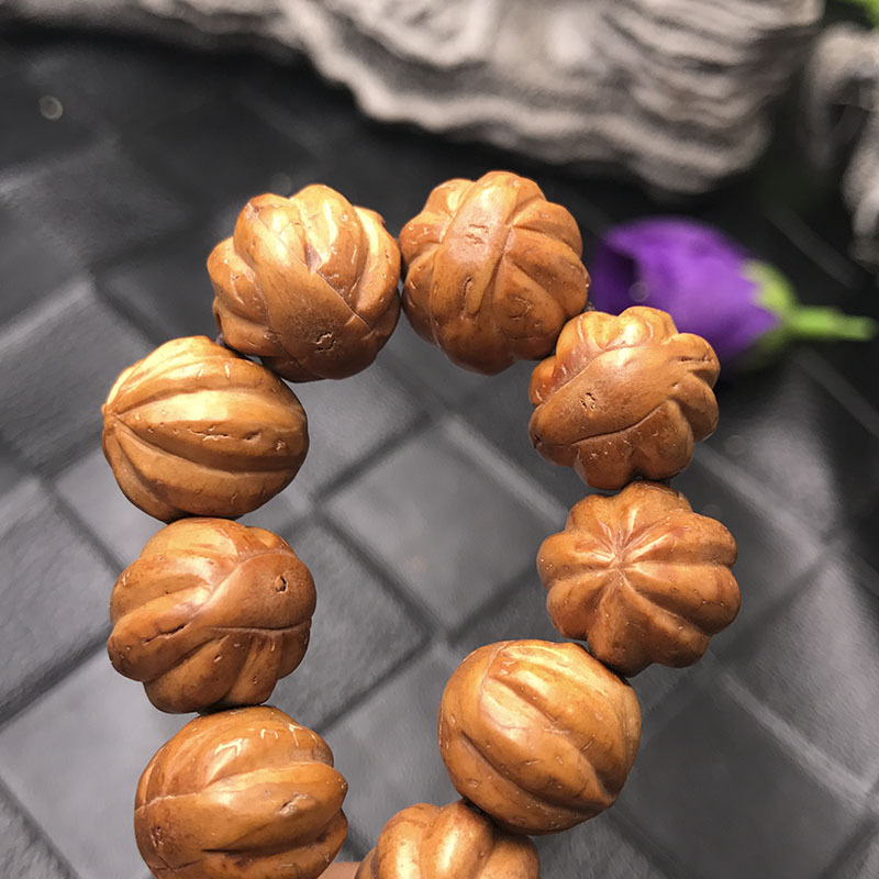 尼泊尔木瓜凤眼瓜珠菩提子红皮圆籽精选凤眼 手串 diy批发