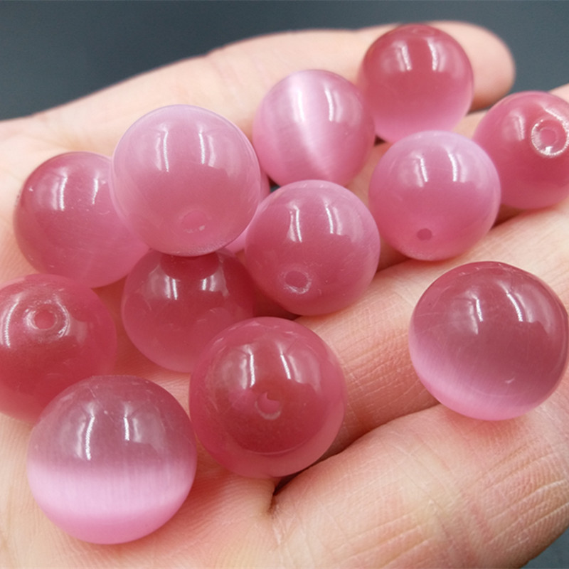 厂家直销 精品冰种粉色猫眼石圆珠散珠批发 粉色玉珠子散批
