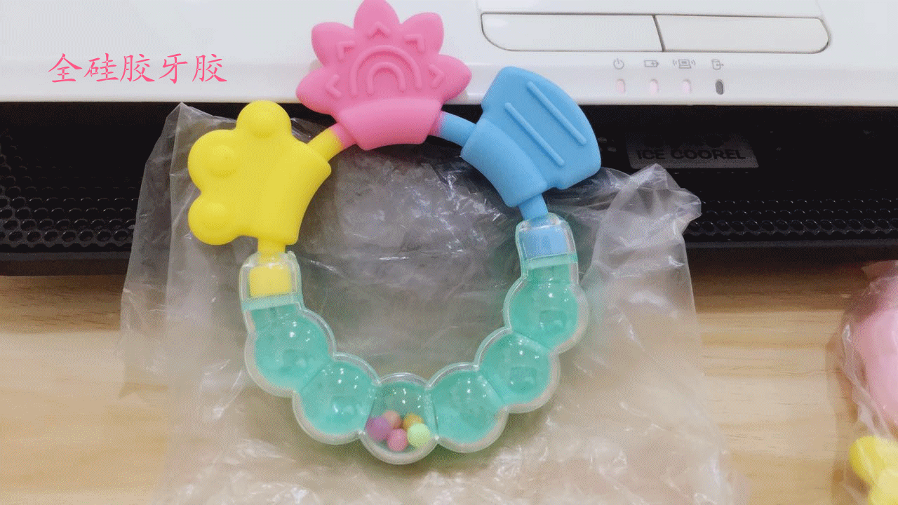 新款全硅胶摇铃牙胶磨牙棒锻炼宝宝牙齿咀嚼