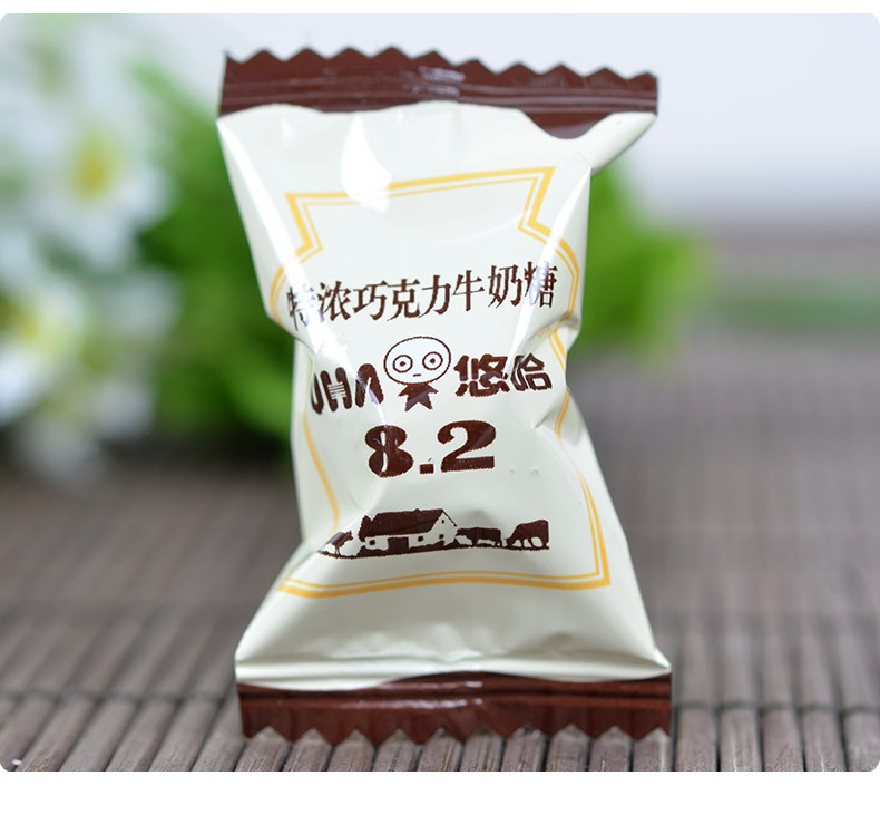uha悠哈特浓牛奶糖果 特浓巧克力草莓糖 休闲零食102克/包