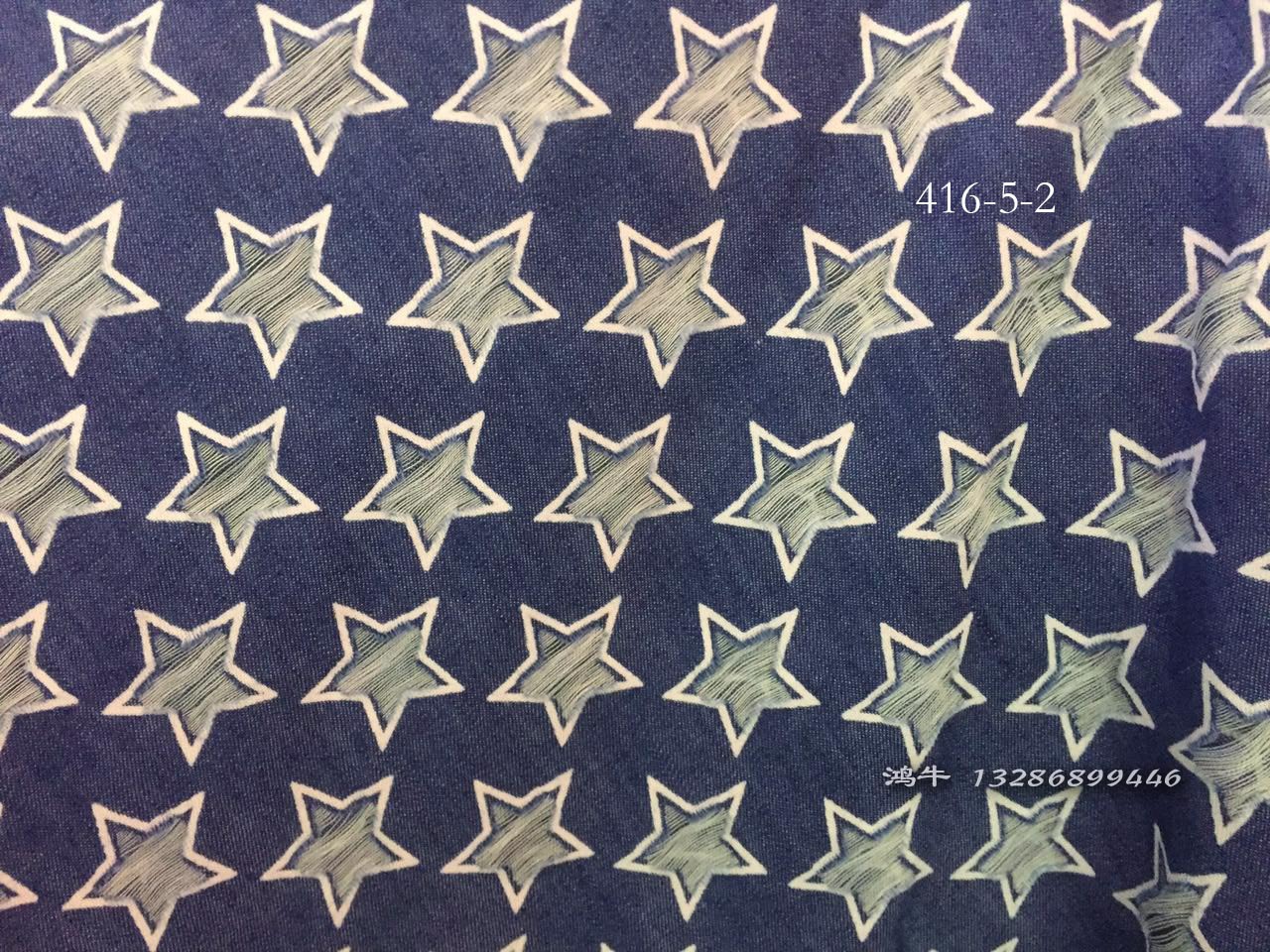 个性复古烧花印花牛仔面料星星五角星小太阳冲孔破洞牛仔布料