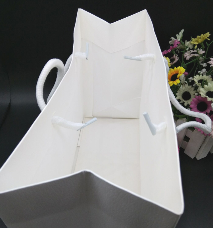 新款供应 特种纸手提袋 立体纸袋 购物包装方底袋 广告印刷袋质优