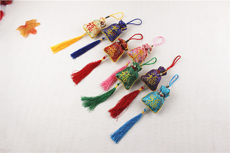 香包纹饰图案书法字画尺寸颜色随机发产地中国绣品类型其他绣品十字绣