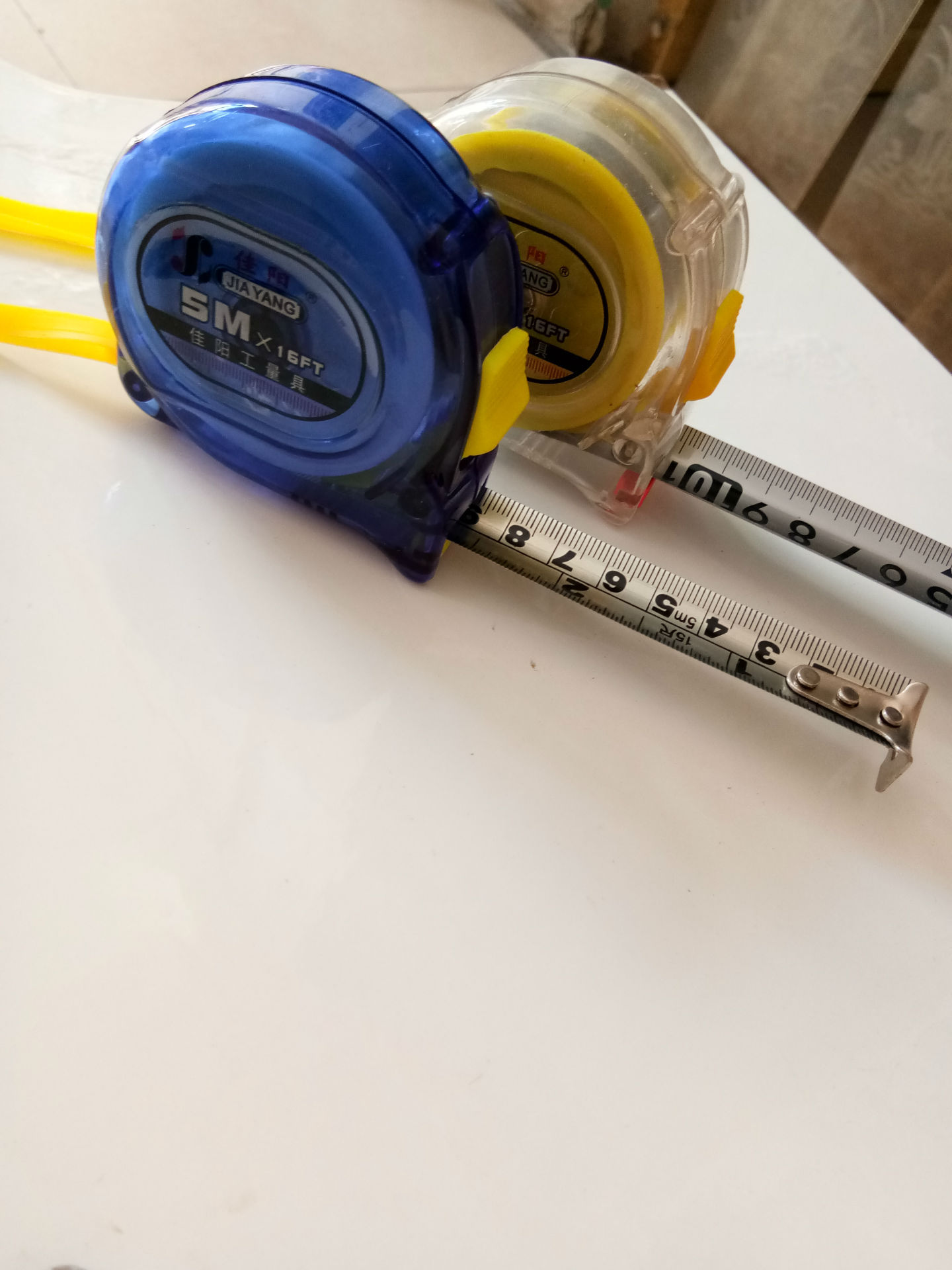 厂家直销不锈钢带白漆带钢卷尺透明壳钢卷尺5米钢卷尺蓝透明卷尺