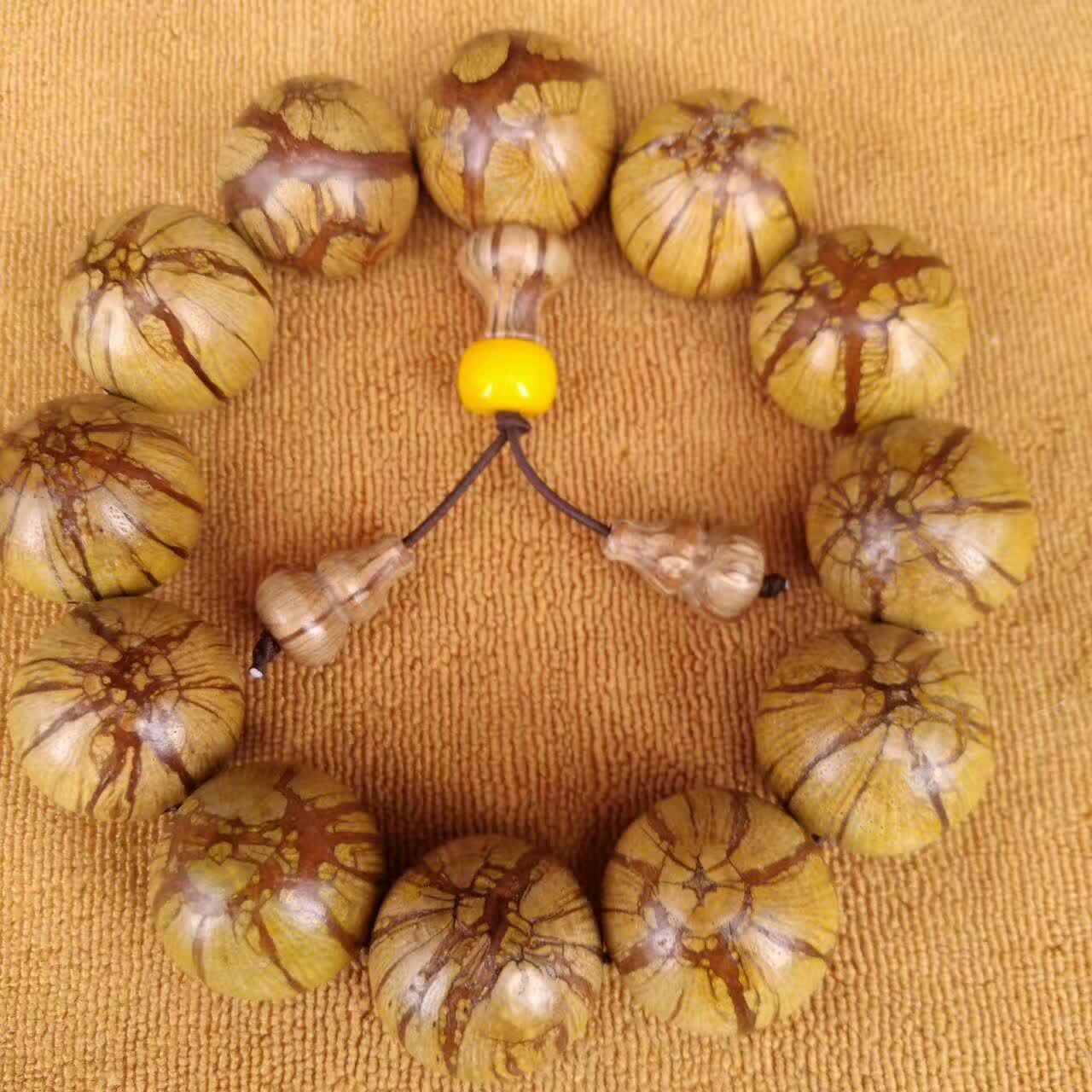 梅花入骨丹沉木抗疲劳手串20mm 男女文玩饰品佛珠手链 厂家批发