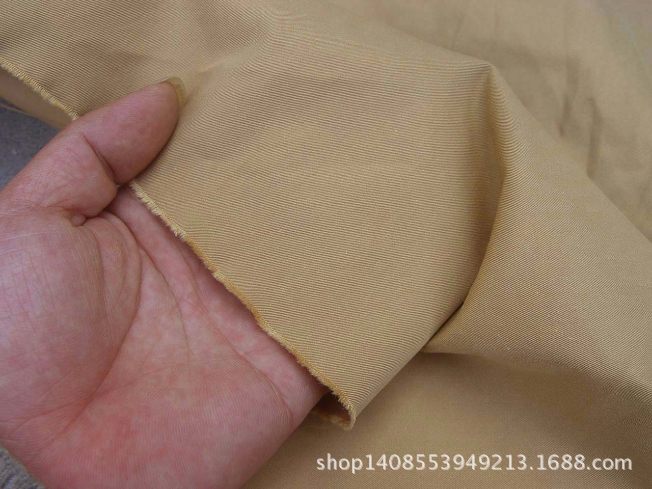 现货全棉纱卡棉布 卡其色棉布斜纹服装面料 休闲装外套布料