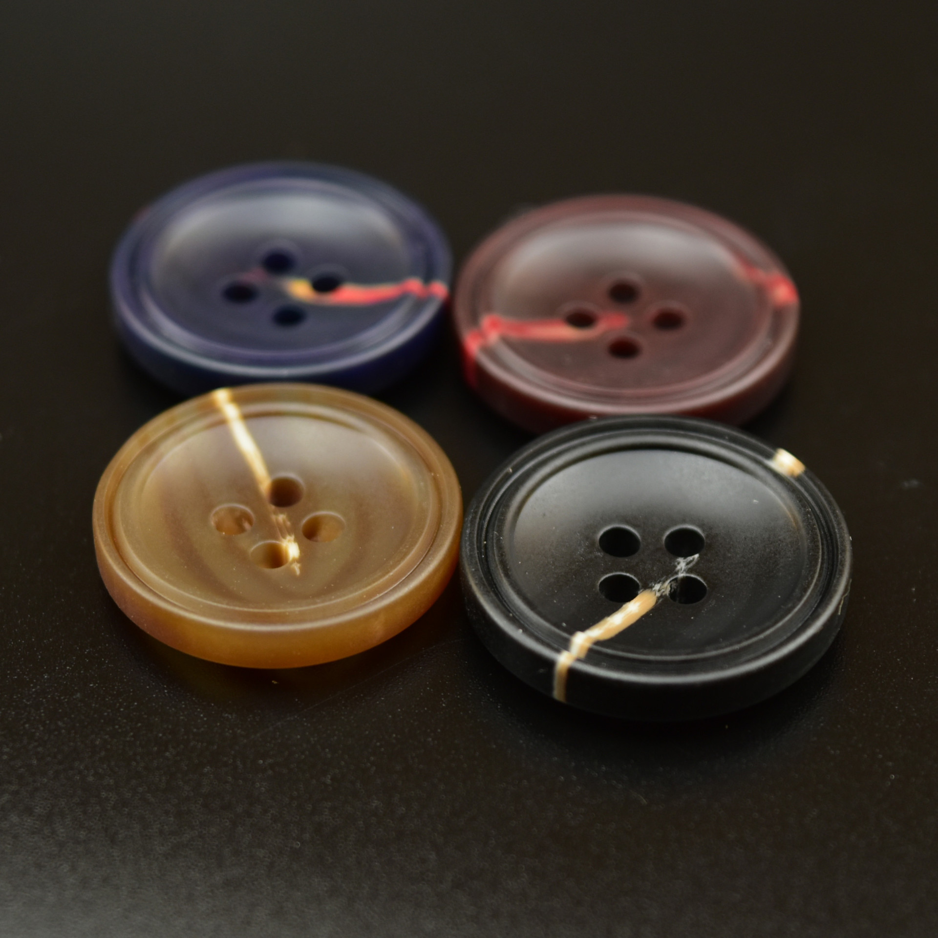 厂家直销树脂纽扣四眼小细边仿牛角扣男士风衣毛呢大衣西装扣