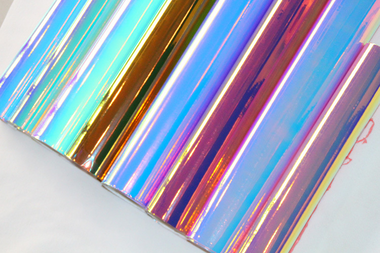 幻彩彩虹烫金箔烫金膜烫印膜pu皮革镜面镭射箱包材料七彩镭射膜