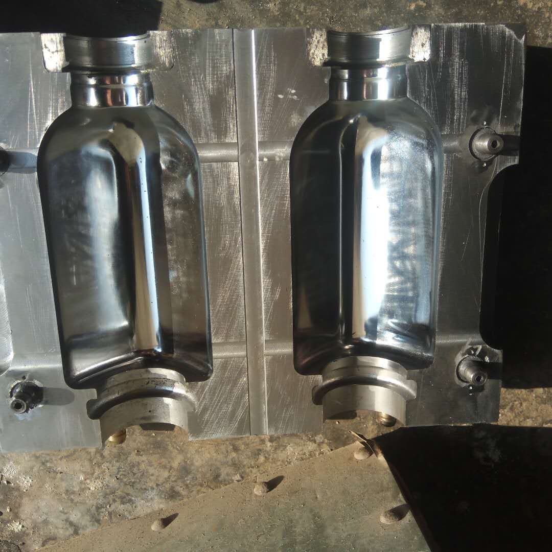厂家供应吹瓶模 吹塑模 塑料瓶模具 磨具 pet瓶模具500方茶tt瓶模