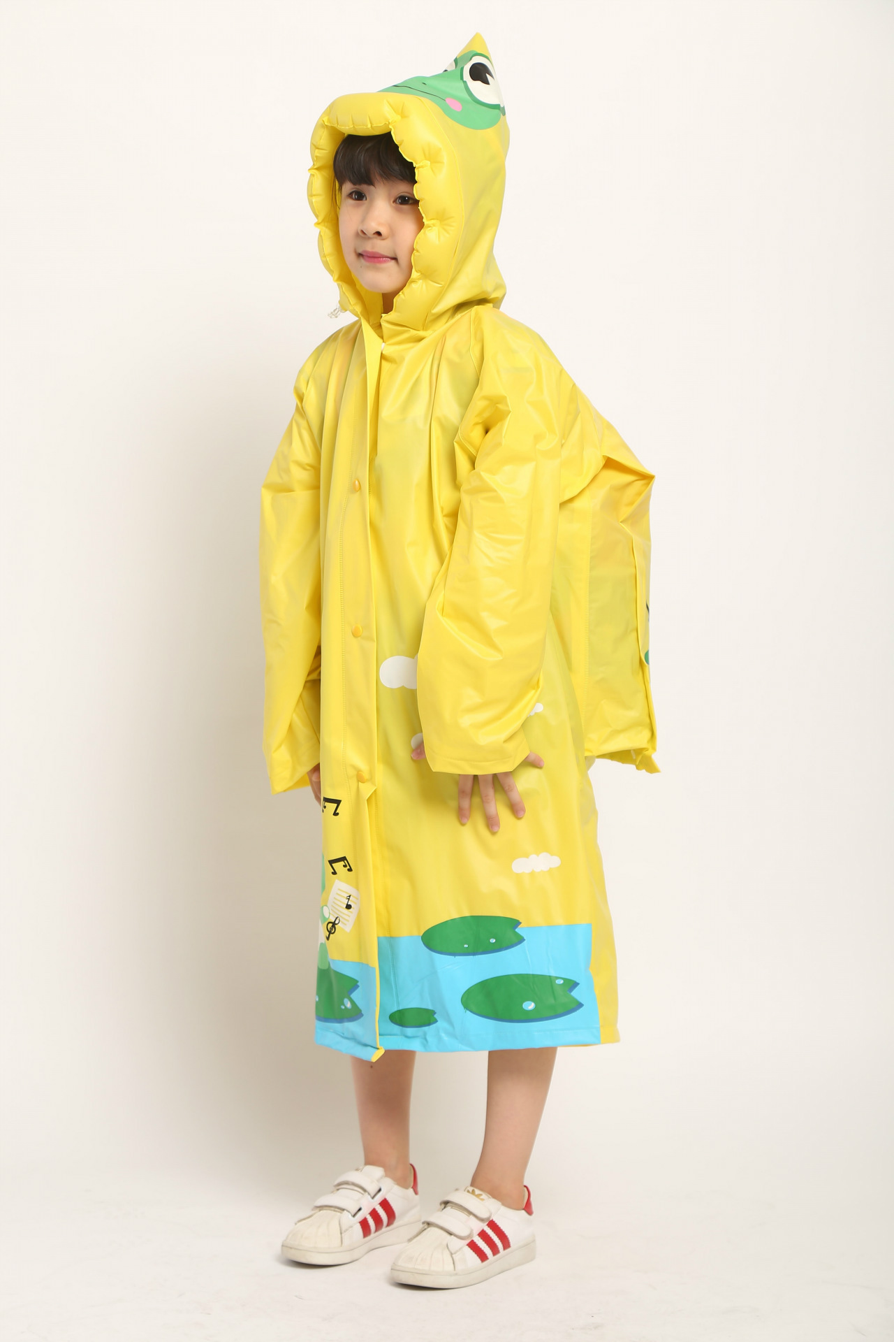透气儿童雨衣pvc时尚防水环保充气帽檐带书包位雨衣小学生雨披