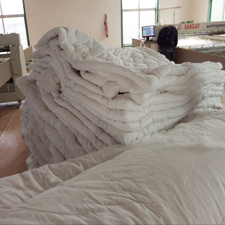 千家家纺 厂家批发宾馆酒店家庭用棉被 纯棉防羽布面料保暖厚棉絮