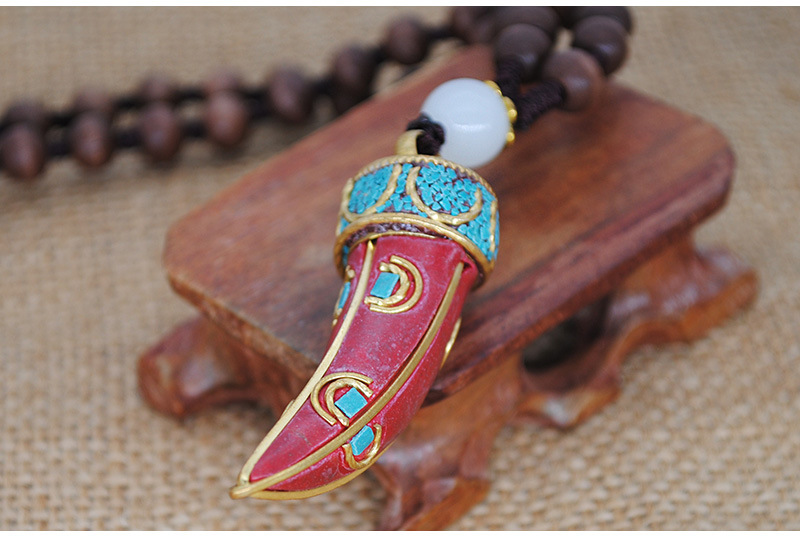 速卖通复古个性民族风立体牛角尼泊尔吊坠毛衣链挂件配饰男女同款
