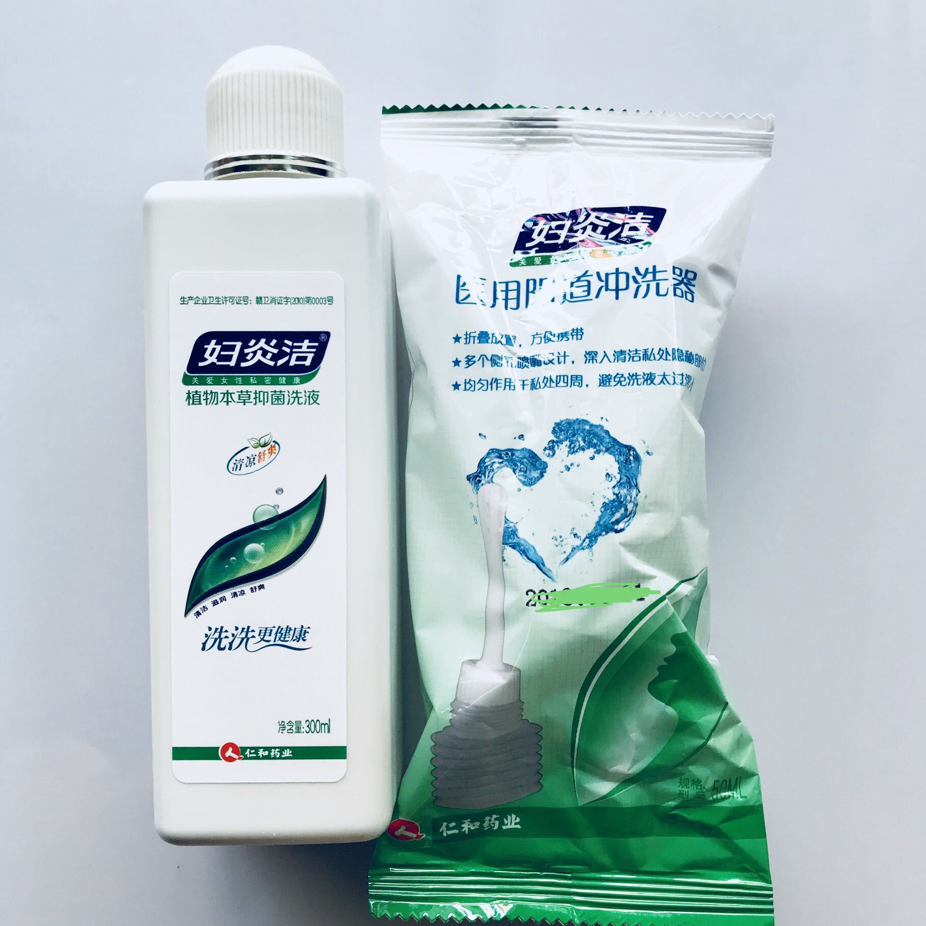大量批发妇炎洁洗液300ml 送冲洗器 新包装江西仁和