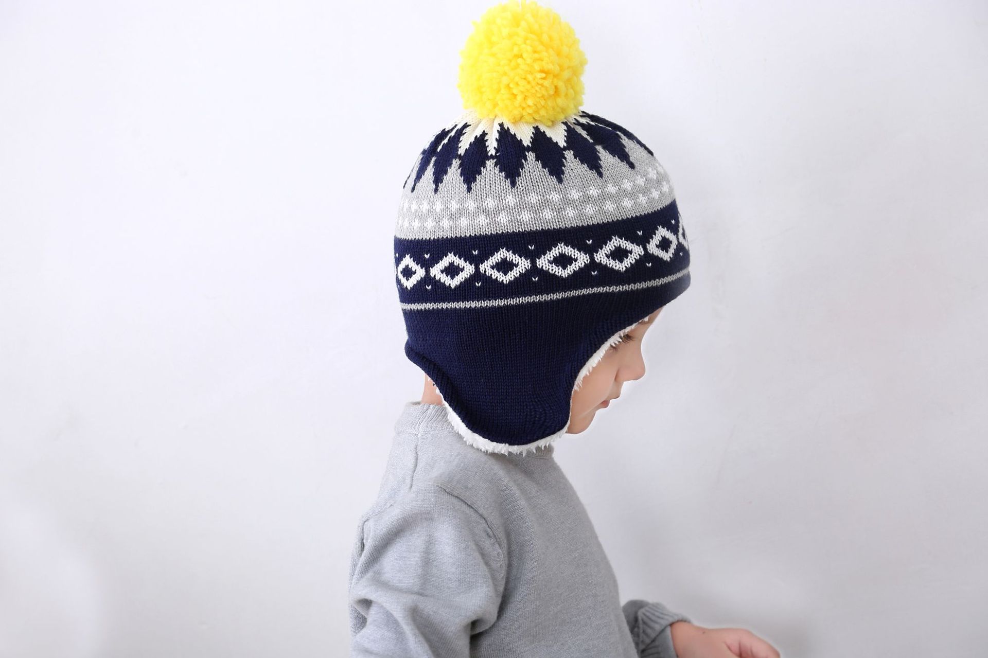 外贸原单工厂藏青黄球菱形几何儿童秋冬帽绒线帽童帽针织帽风雪帽