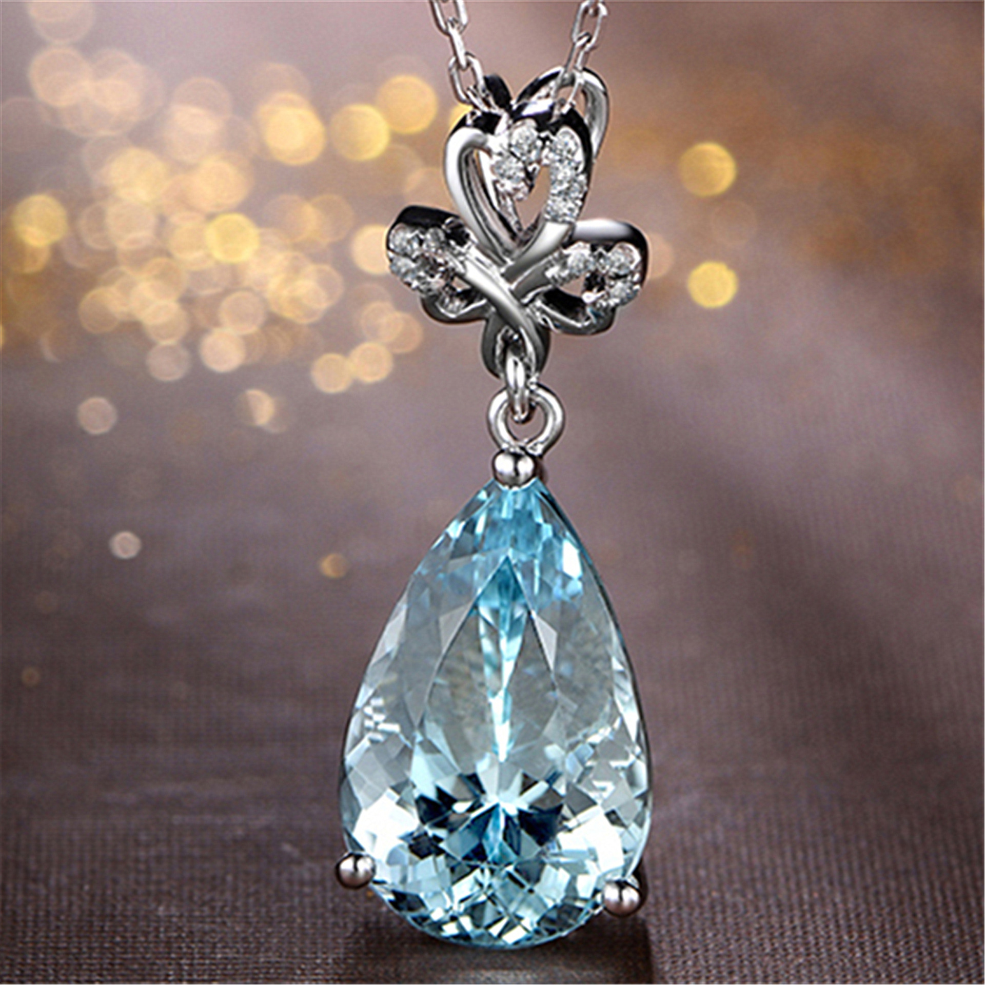 气质幸运三叶草吊坠 仿天然海蓝宝吊坠镀18k白金镶嵌钻石彩宝项坠