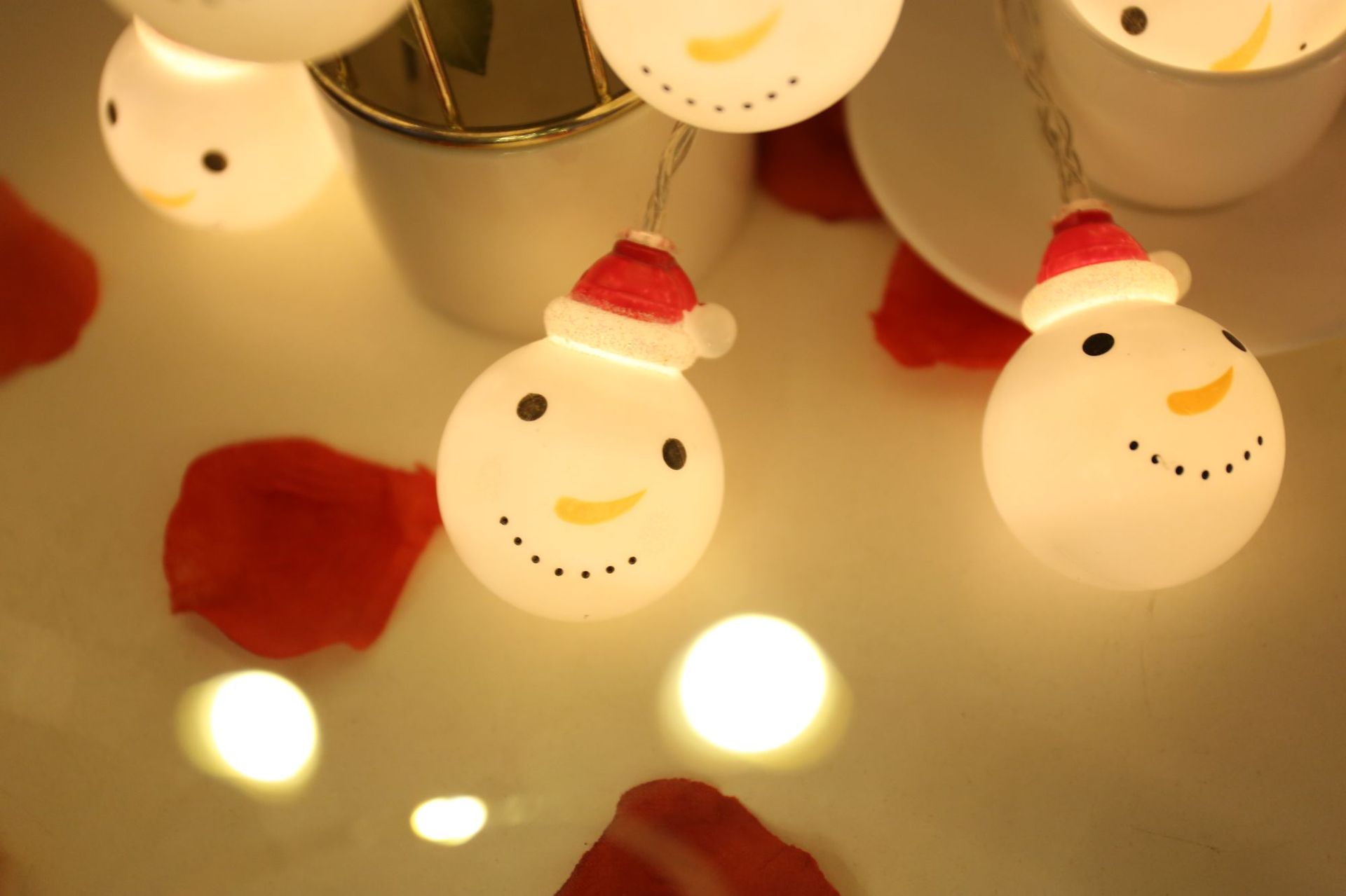 厂家直销led雪人灯串 圣诞节日装饰彩灯防水电池盒圣诞老人头灯串