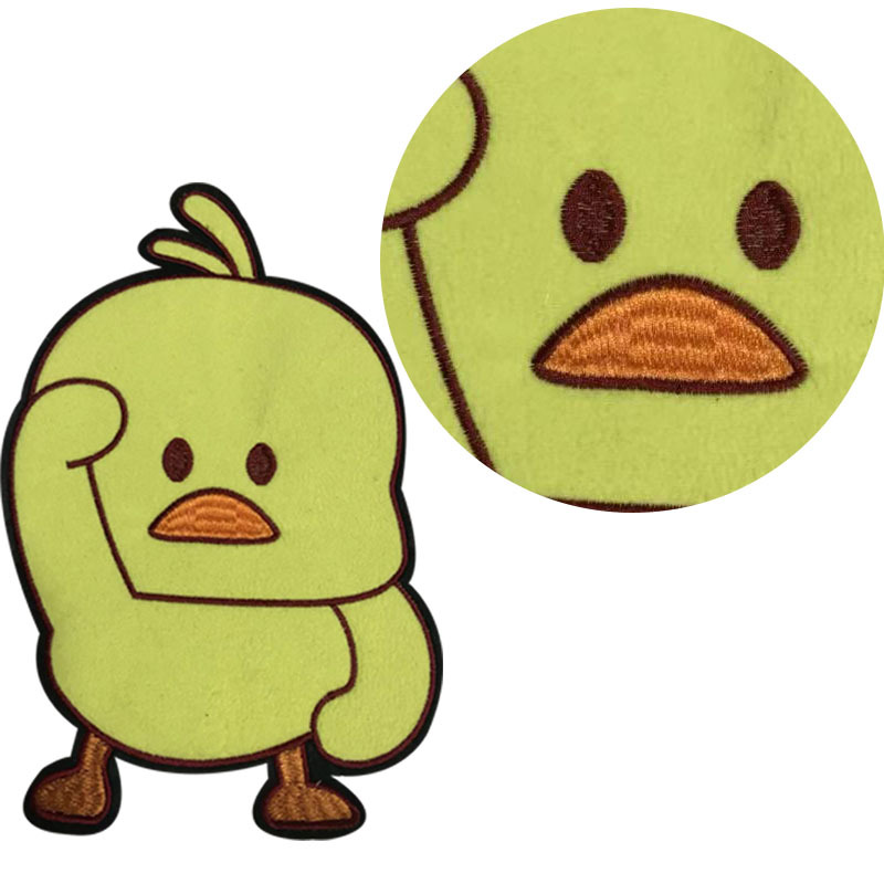 02 kg产品介绍产品特征布贴材料: 刺绣图案:小黄鸭特征:刺绣适合