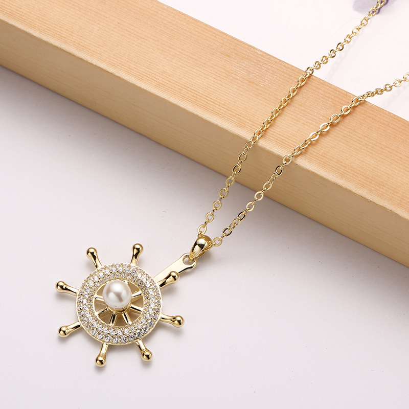 镶钻吊坠欧美时尚船舵项链s925银旋转锁骨链女生个性珍珠饰品代发