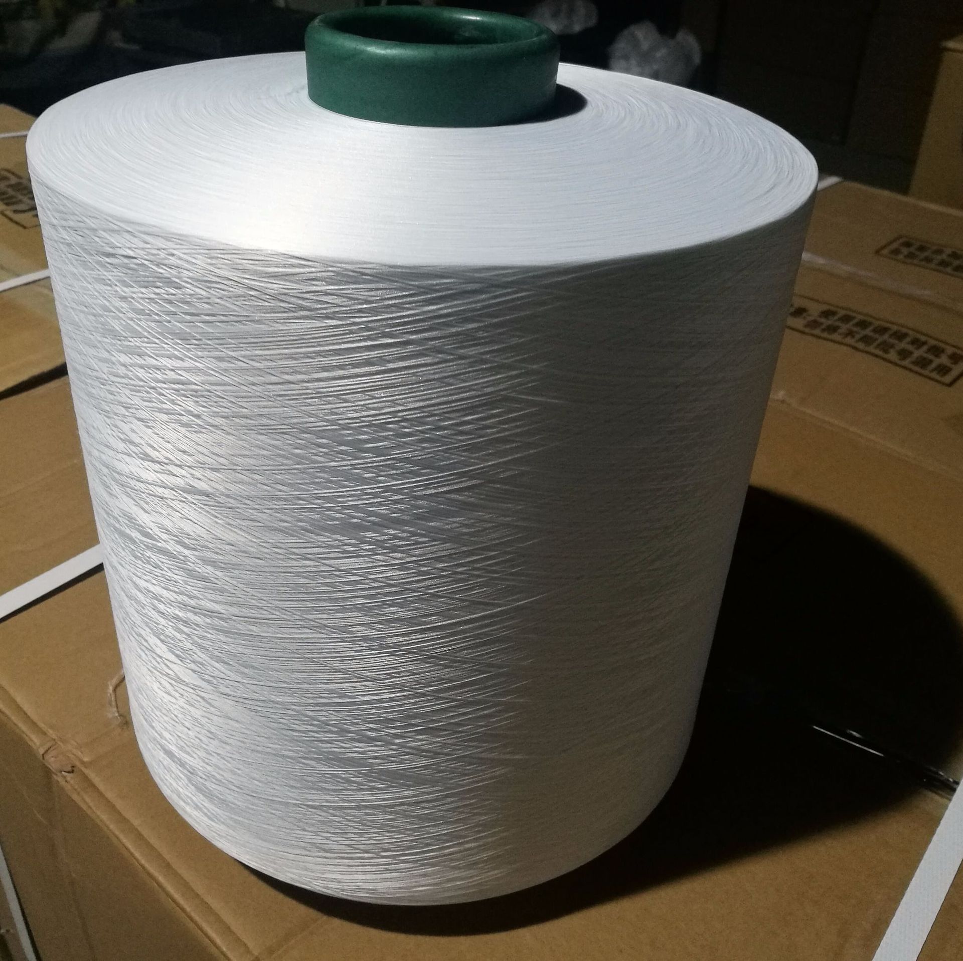 现货供应涤纶丝150d288半光扁平低弹网络丝轻网白色dty