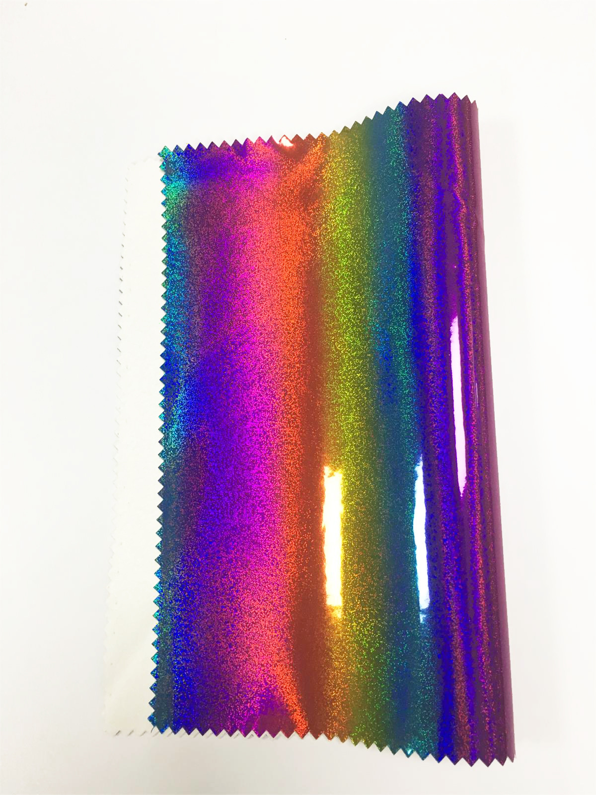 厂家直销彩虹镭射pu革 亮面幻彩皮革 柔软光滑 手袋箱包软包面料