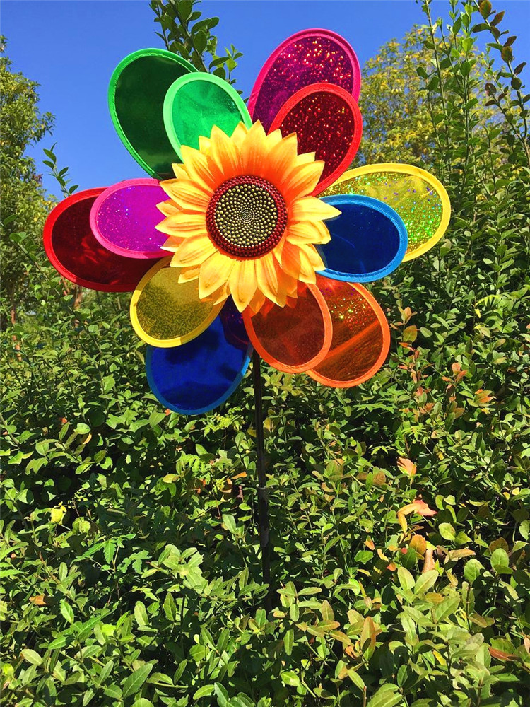 风车直径38cm 杆长57cm 总长75cm品名:三层六瓣花向日葵大风车包装