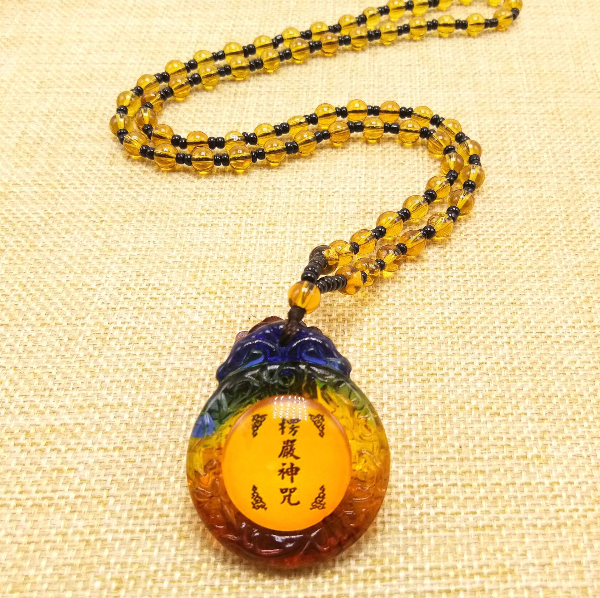 新款仿琉璃楞严咒项链男女通用楞严咒挂件毛衣链结缘品_义乌玉杰首饰