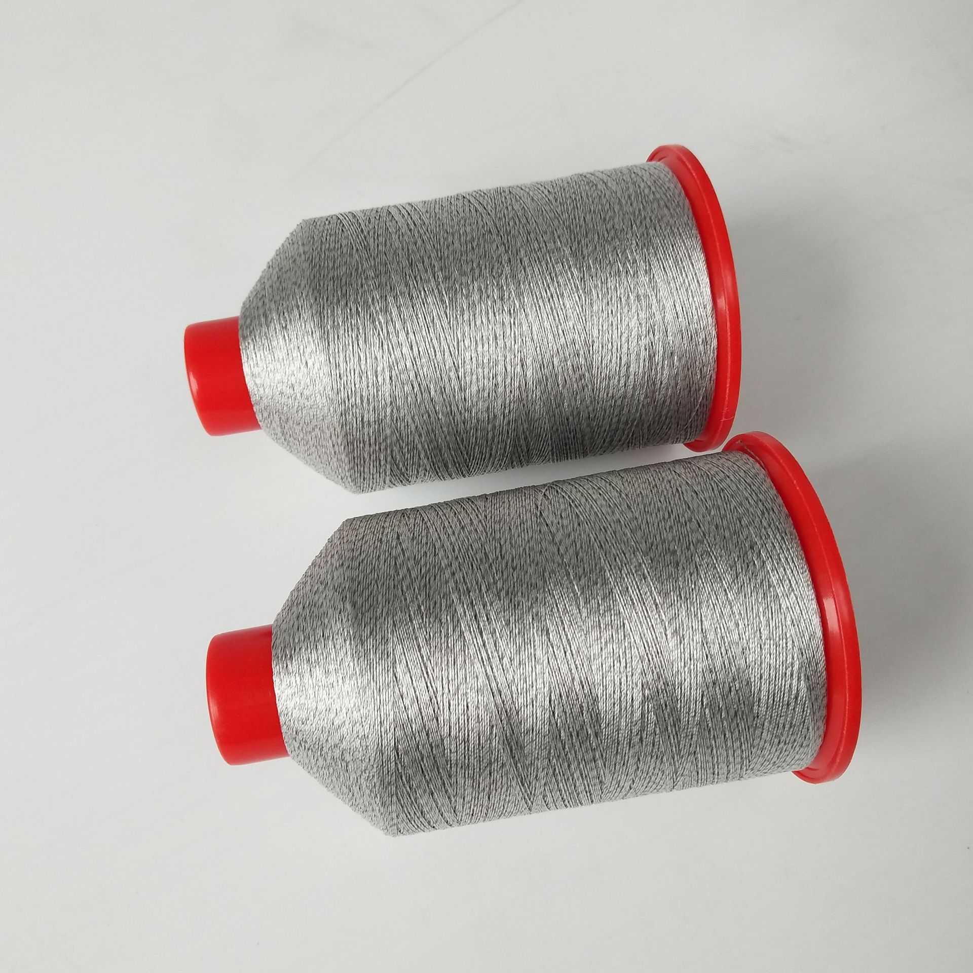 150d/3涤纶长丝防静电缝纫线 不锈钢纤维导电线 200克/卷