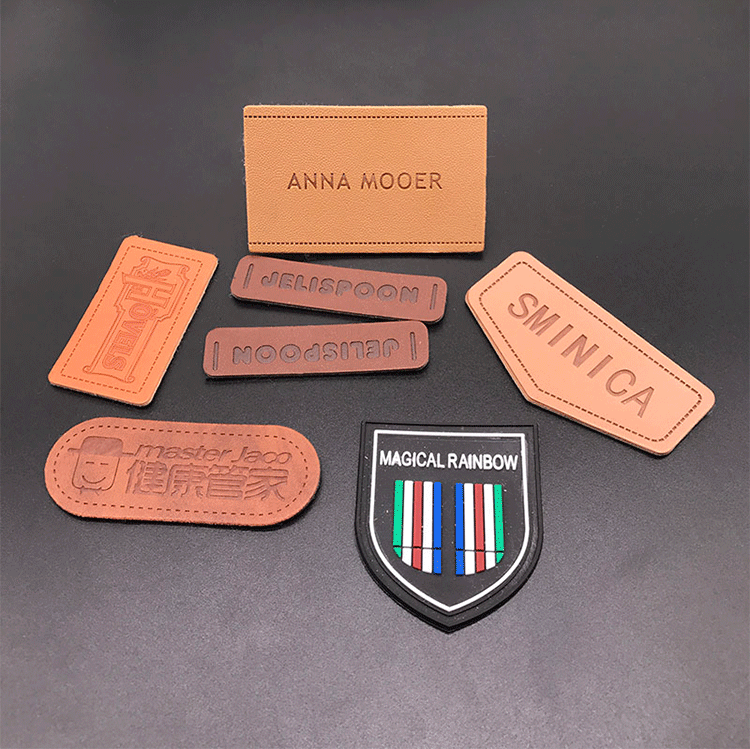 厂家生产 服装皮牌 皮标定做 牛仔裤腰牌 热压超纤pu皮标 皮标牌