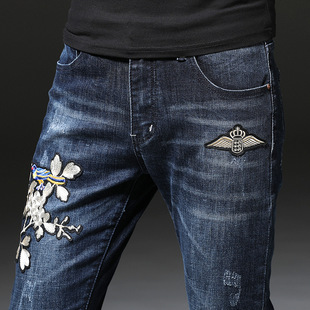 秋冬新款绣花潮流裤子男中国风牛仔裤男修身青年刺绣小脚裤潮流酷