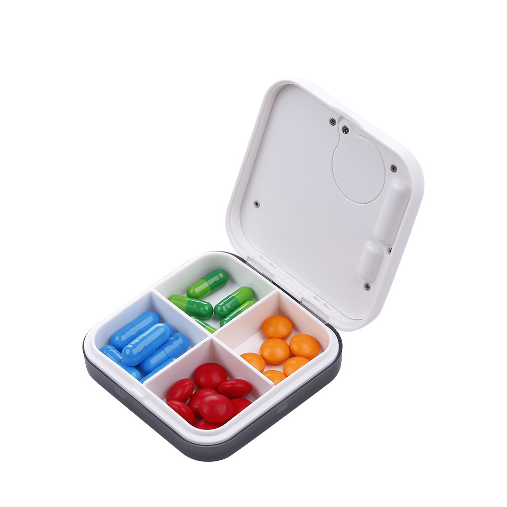 迷你便携药盒定时提醒药盒四格创意随身药盒密封随身提醒药盒