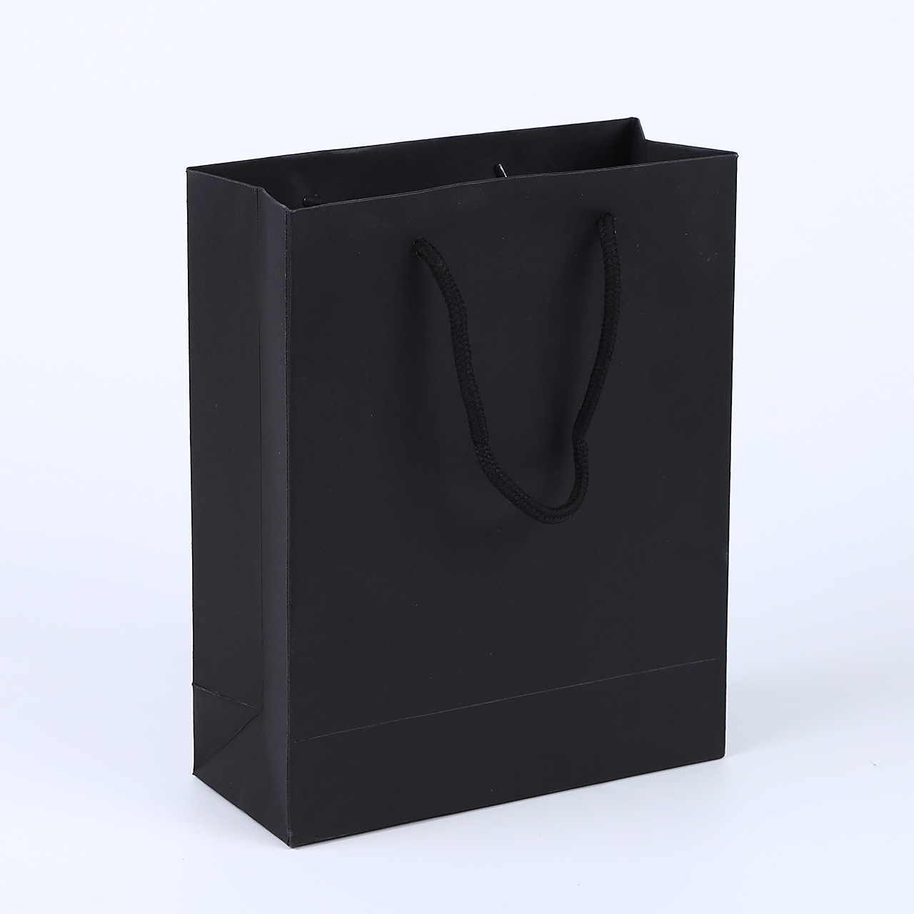 服装手提袋_纸袋白卡纸礼品袋黑色服装购物手提袋环保广告包装袋批发 