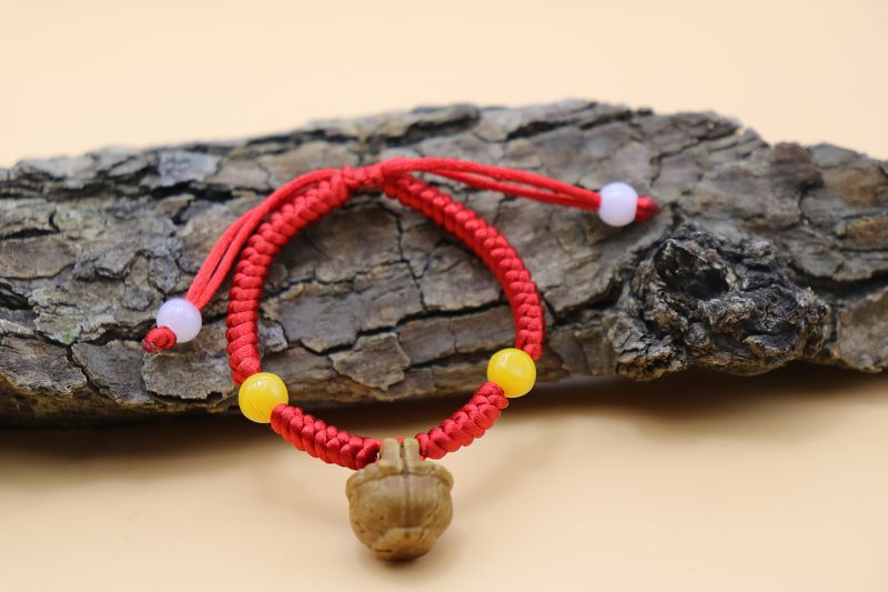宝宝桃筐 儿童手编红绳结 桃核雕刻 狗牙猪骨 diy饰品材料 手链