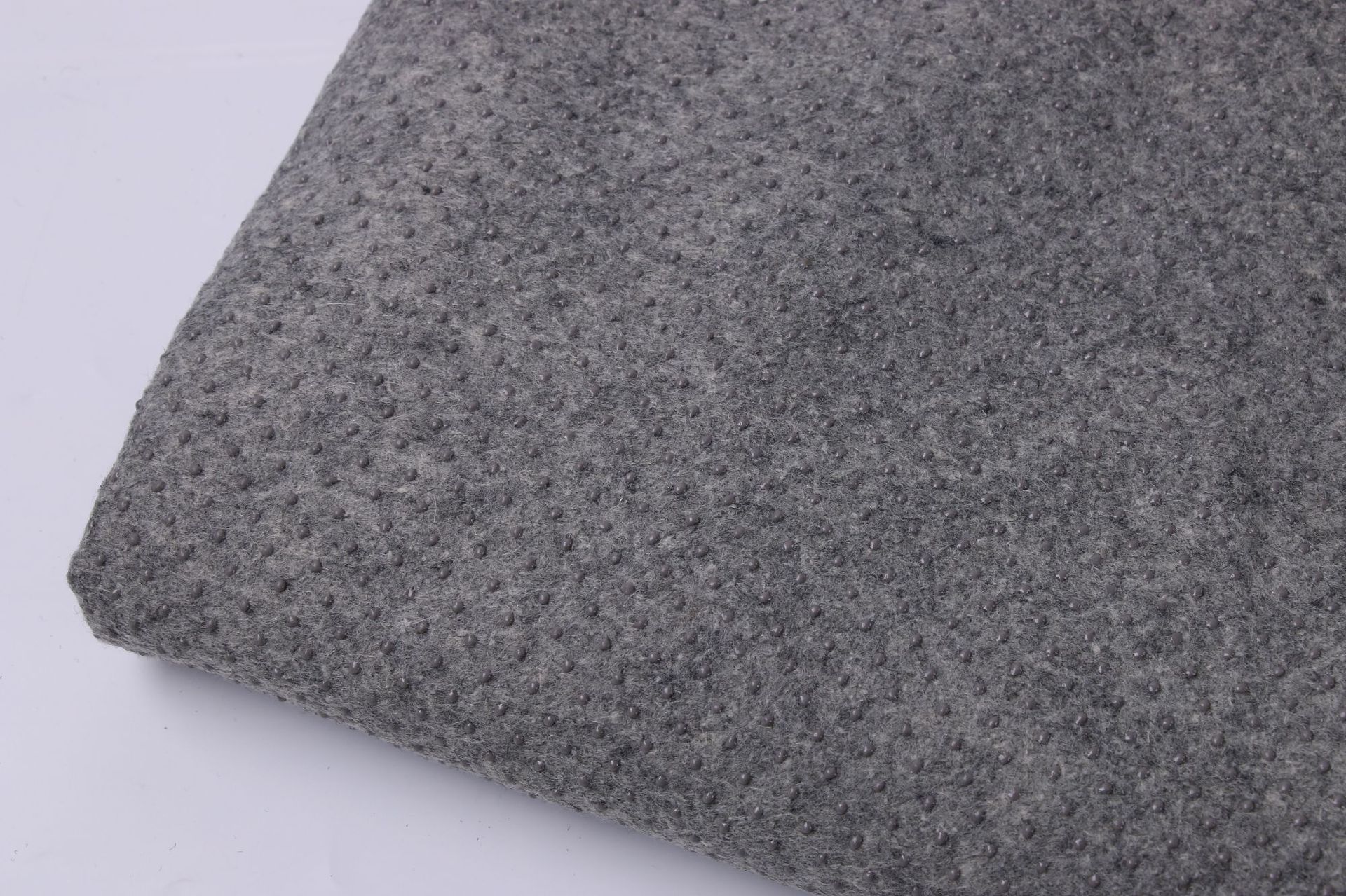 防滑滴塑无纺布 宠物点胶止滑针刺布 地毯脚垫沙发面料批发