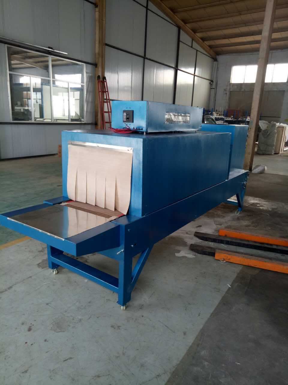 pvc膜热收缩包装机 啤酒缩包机塑包机饮料膜包机