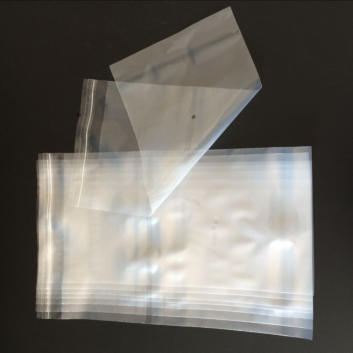 现货pe自粘袋带警告语 定做透明opp元线袋平口袋印刷logo衣服袋