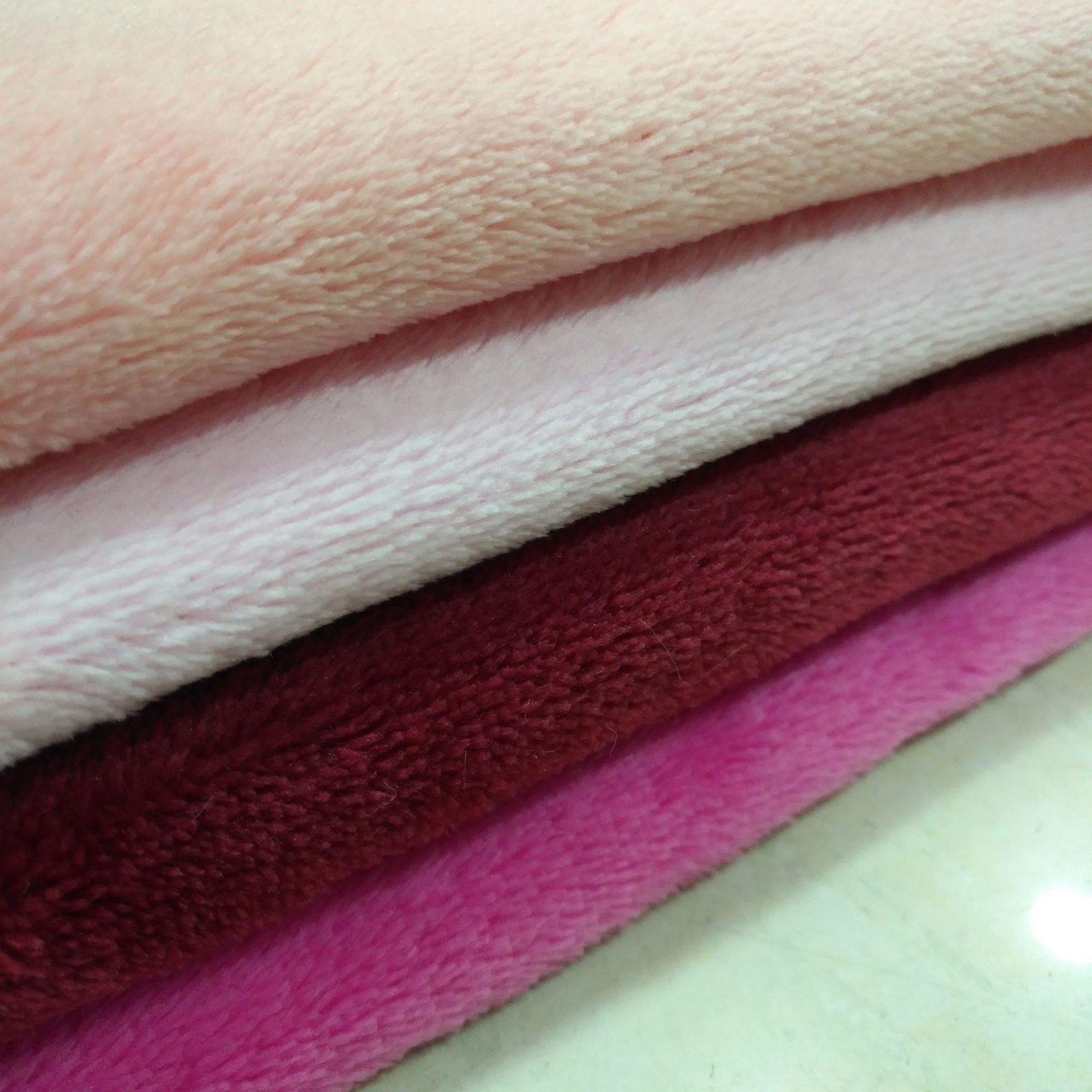 现货 法兰绒 双面超柔软绒布 毛毯婴睡 衣优质家居针织面料供应