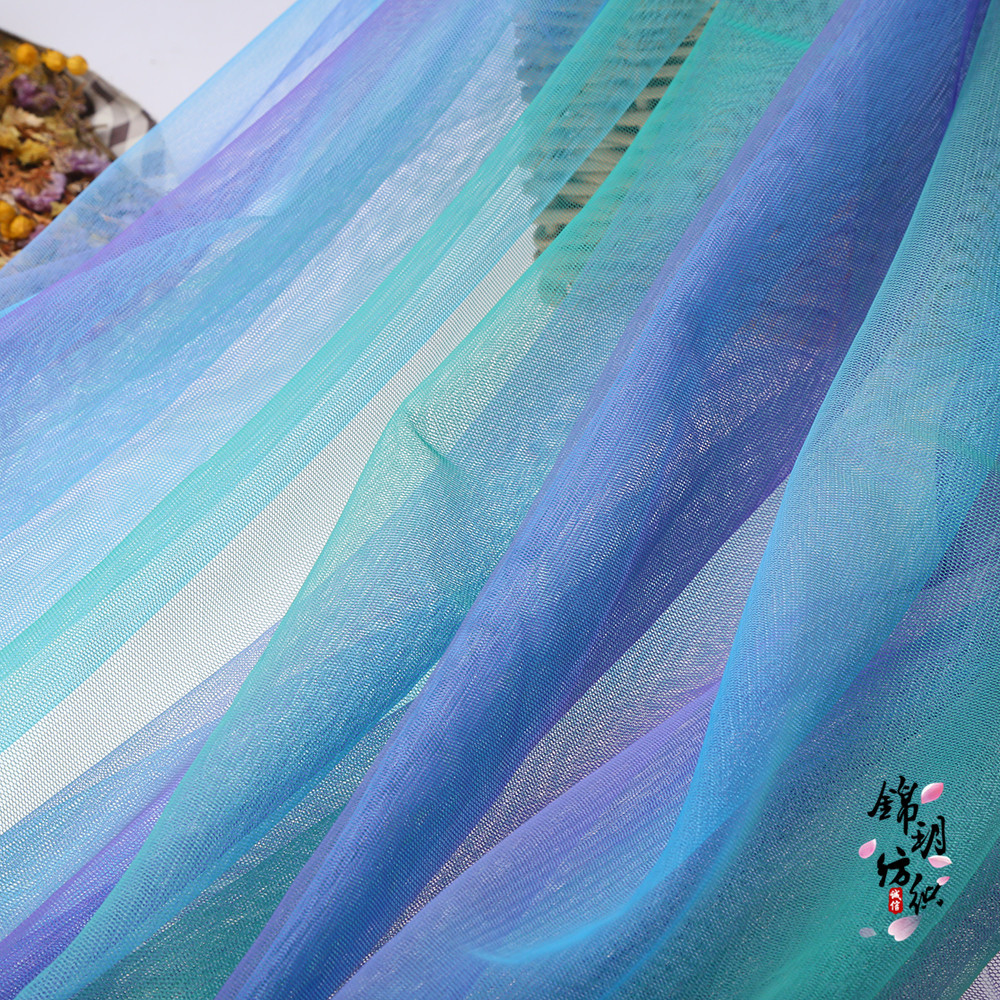 过渡色彩虹网纱布料渐变色网眼纱背景装饰拍摄道具服装面料批发