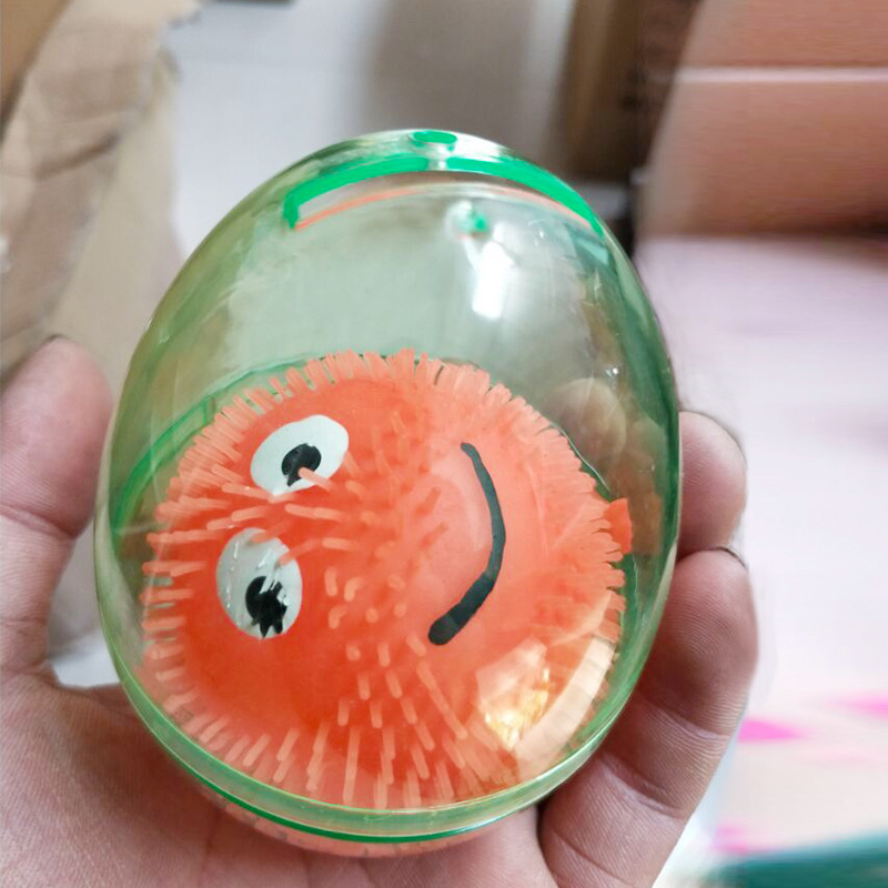 厂家直销扭蛋机游乐机专用70mm金蛋壳 存钱罐发条包装弹力球批发