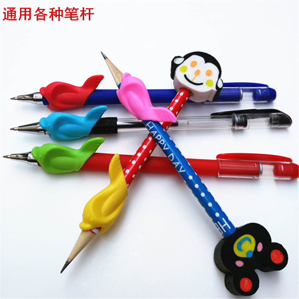 新款海豚 创意硅胶 小鱼握笔器 儿童学生写字握笔矫正器批发环保