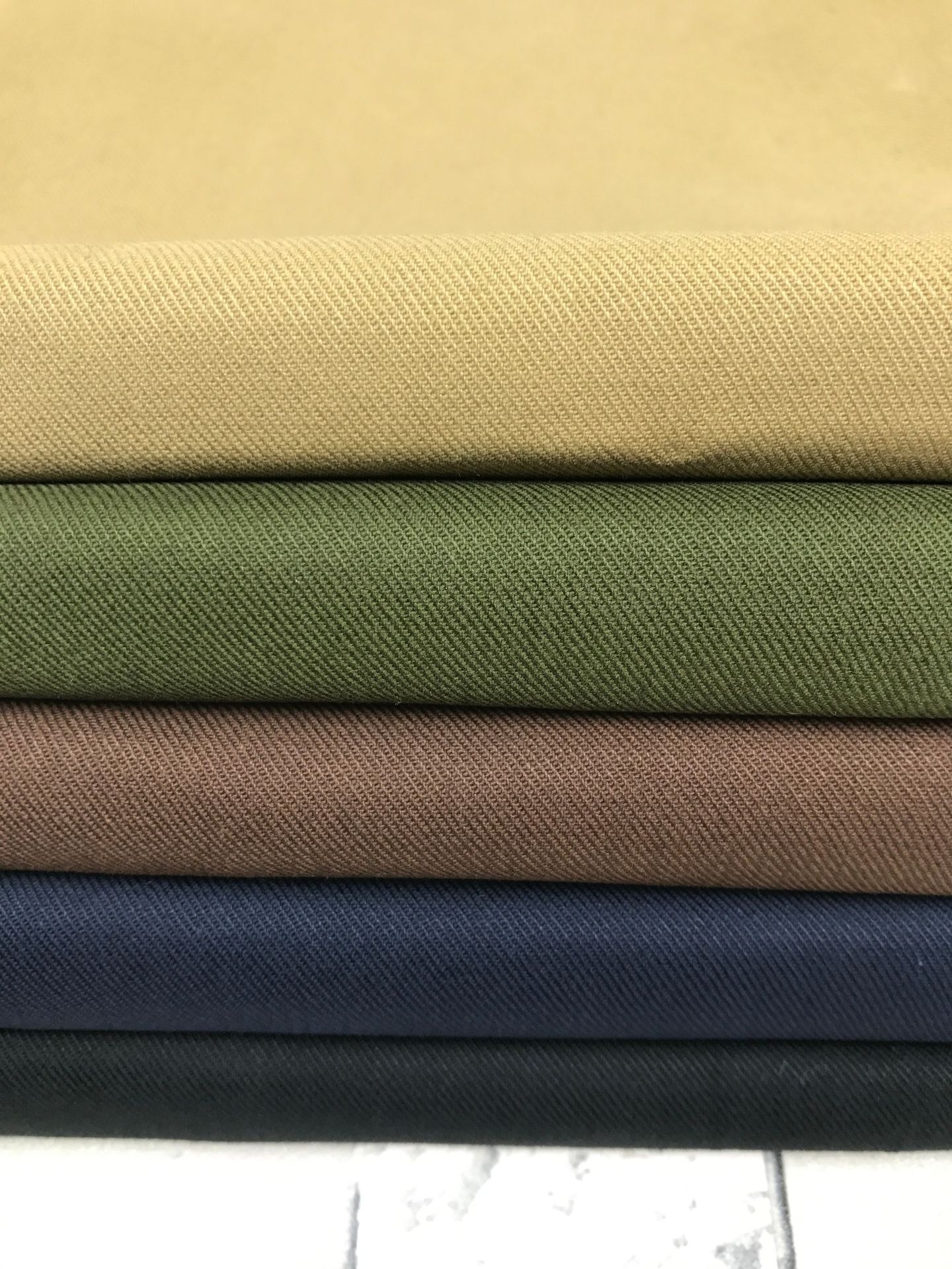 现货供应纯棉弹力布 双面斜弹力600 童装休闲外套裤装服装面料