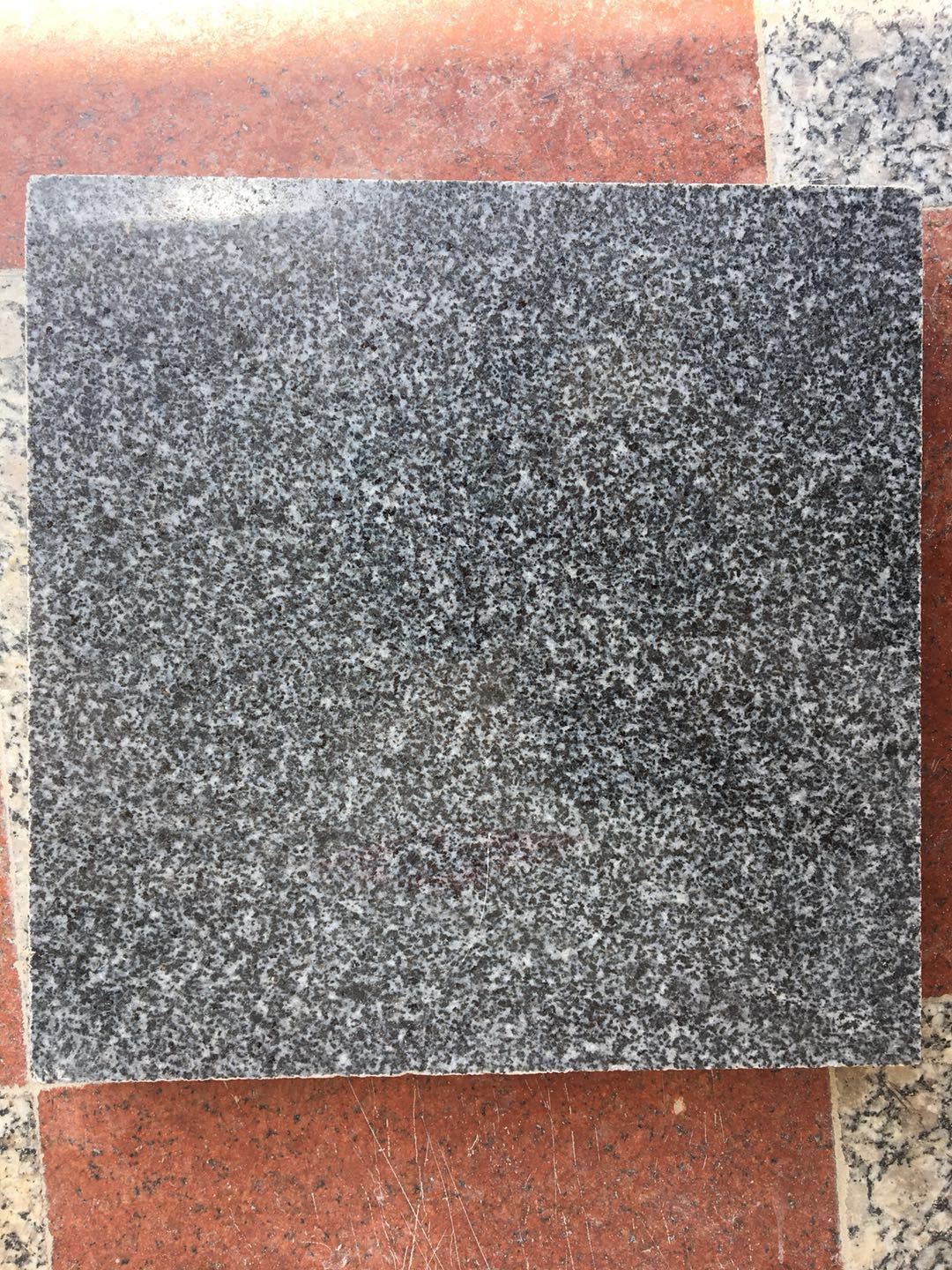 章丘青芝麻黑石材厂家供应可用作园林景观干挂