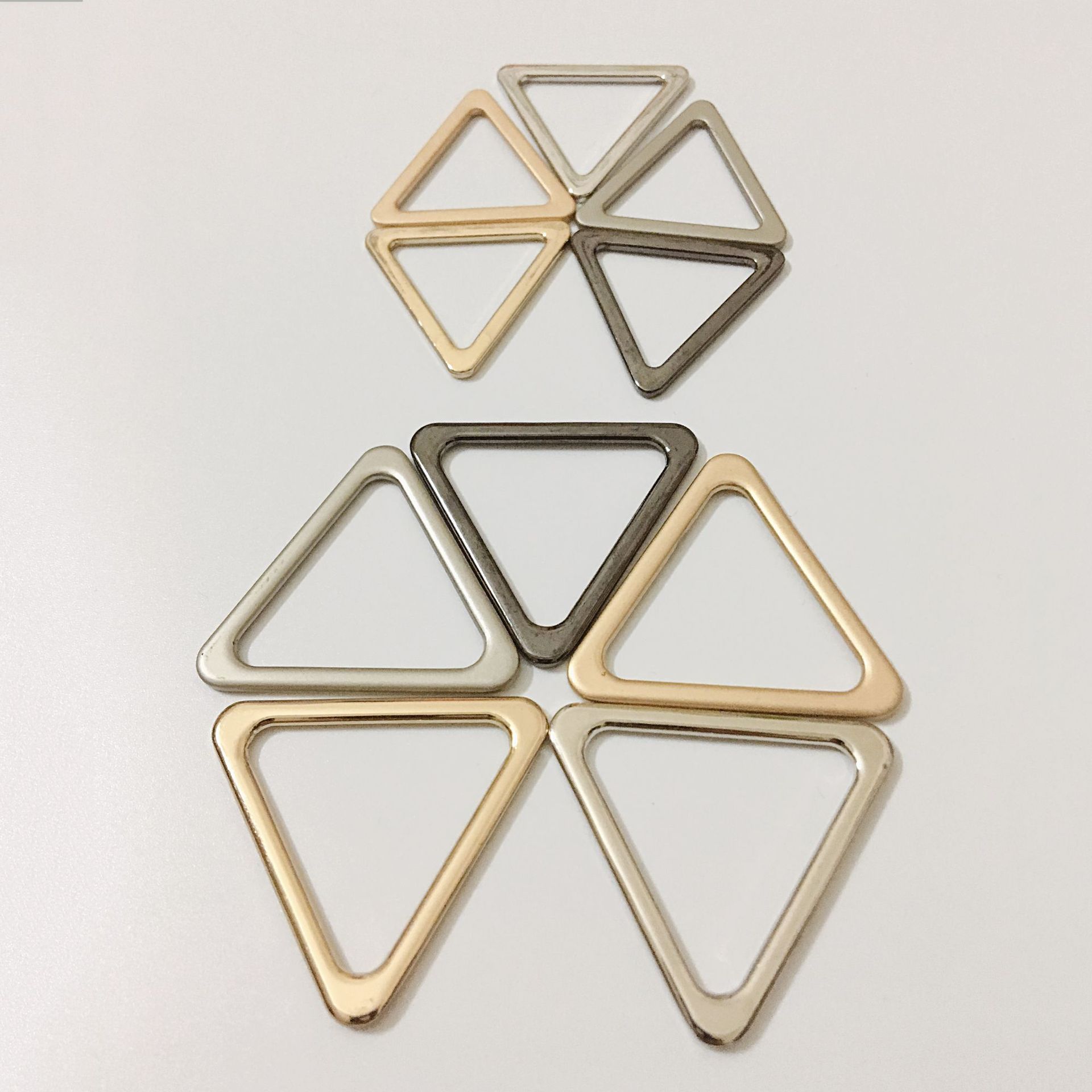 2018新款金属纽扣挂镀三角形包包扣大衣合金扣五金配件现货供应