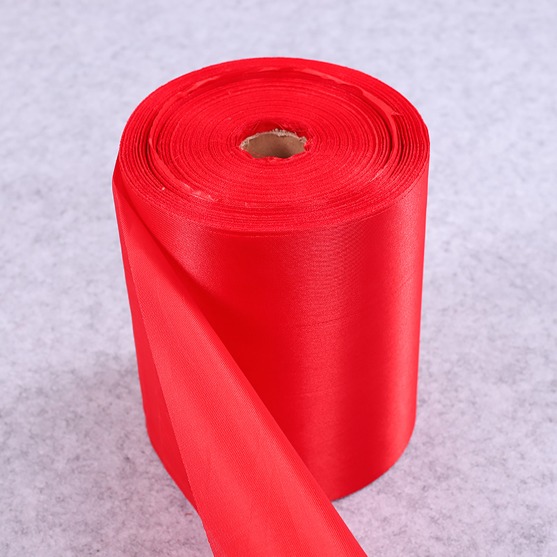 批发喜庆大红绸布剪彩大红花布条舞狮腰鼓用红绸布八美缎布