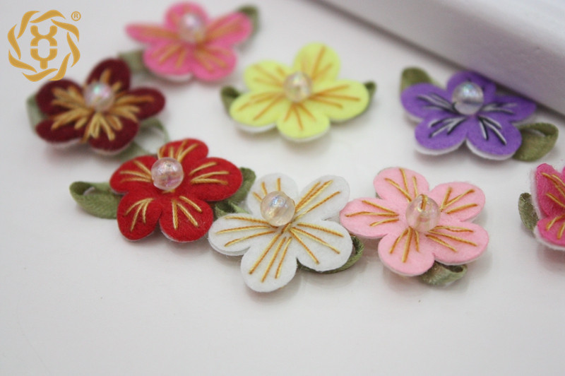 5cm无纺布手缝花芯用途:女鞋,袖套,围裙,童裙童装,头饰,家纺,内衣等