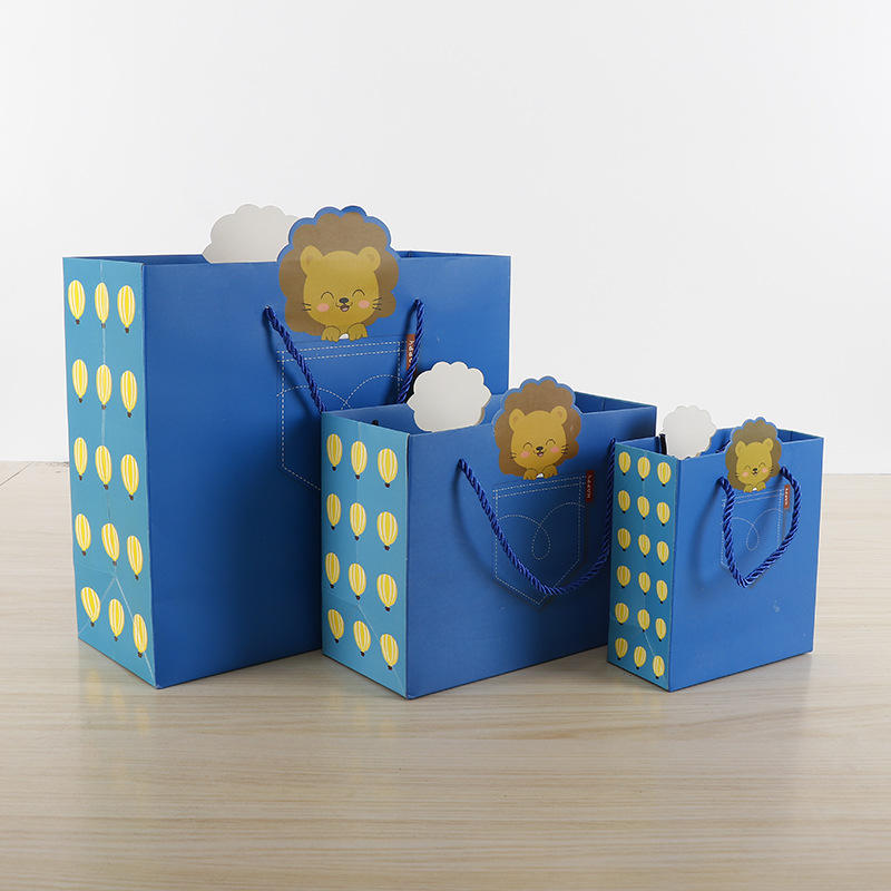卡通礼品儿童喜爱礼物袋 小狮子手提白卡纸袋 大中小号可以定制
